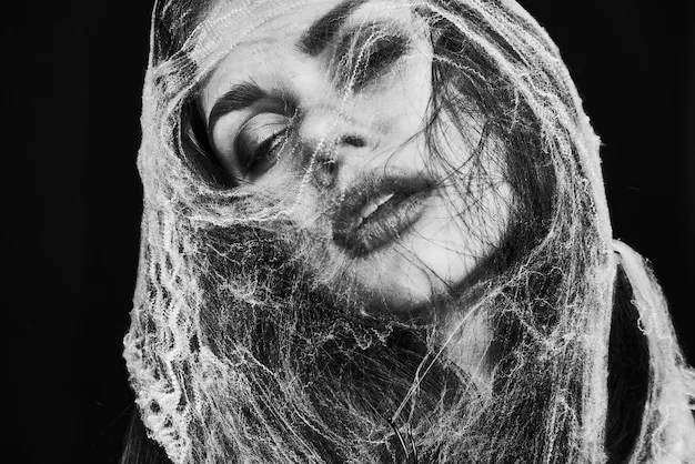 A black and white image from an experimental short film, showing a distorted human face and an unconventional camera angle, conveying a sense of psychological unease and challenging conventional perceptions of beauty in the context of