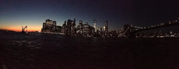 A panoramic view of the New York City skyline, but depicted as a dark and decaying wasteland. Fires burn in the streets, and iconic landmarks are shown in ruins. The image vividly conveys the dystopian atmosphere that contributes to The Enduring Appeal: Why 'Escape from New York' Remains a Cult Favorite 44 Years After Its Debut.