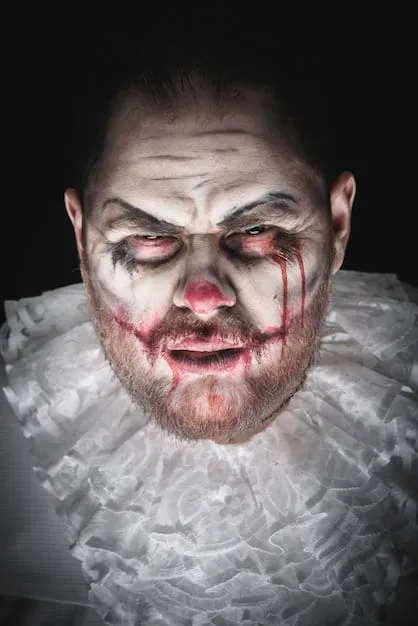 A still from 'The Evil Dead' showing a close-up of a possessed character with grotesque makeup and bulging eyes, surrounded by dark, eerie lighting. The image conveys a sense of terror and showcases the film's groundbreaking special effects. The title 'Cult Classic Horror: Analyzing the Groundbreaking Effects of 'The Evil Dead' 44 Years Later' can be used as alt text