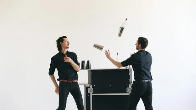A boom operator holding a shotgun microphone above a pair of actors on a low-budget film set. The scene is being filmed indoors, with minimal background noise.
