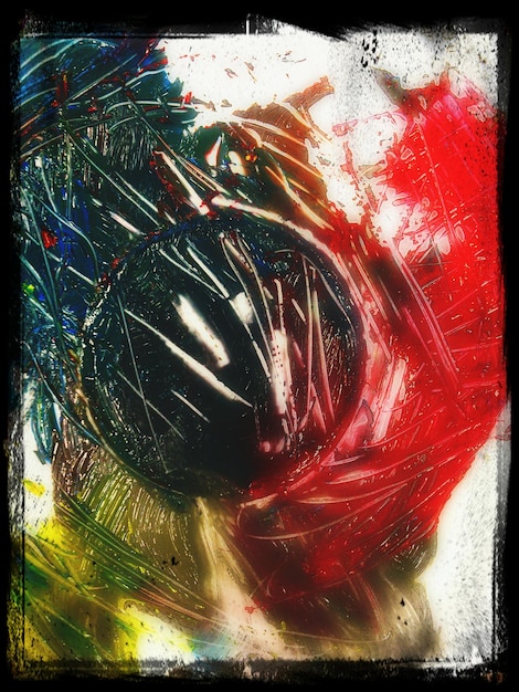 A close-up of a vintage movie poster showing textured brushstrokes and vibrant color gradients. The poster is framed, highlighting the details of the hand-painted artwork.