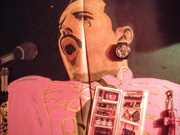 A close-up of a vintage, folded international cult film poster featuring bold graphics and non-English text, showcasing wear and tear that adds to its authenticity and value.