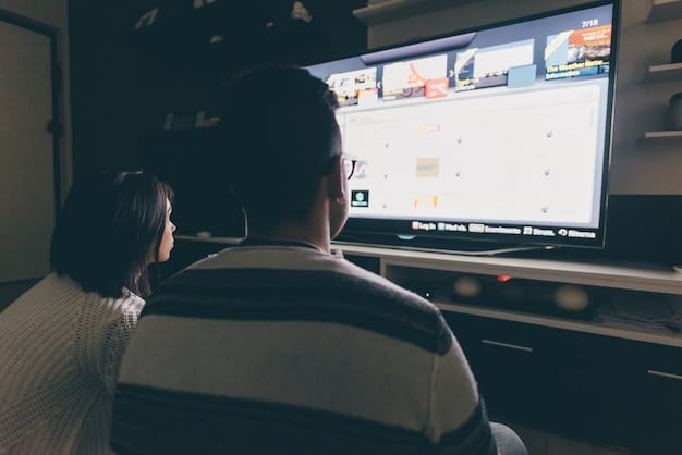 A person browsing an online streaming service dedicated to independent films. The screen displays various film posters and details, highlighting the diversity of the selection. Thumbnails of new indie films are displayed.