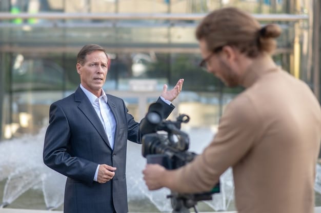 A director giving feedback to a small, but dedicated film crew on a set that is clearly using creative, makeshift solutions for equipment and set design. The focus is on collaboration and problem-solving in a resource-constrained environment.