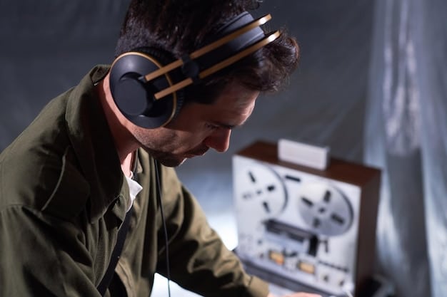 A filmmaker wearing headphones, intently focused on monitoring audio levels during a short film shoot. The background includes film equipment and crew members, capturing the atmosphere of a professional film set.