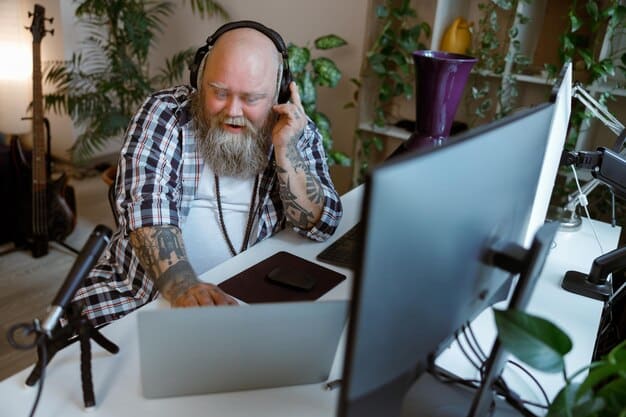 An editor working at a professional editing workstation, focusing on a timeline with various video and audio tracks. The editor is wearing headphones and has a focused expression.