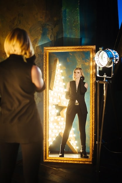 A split-screen image. On one side, a director giving instructions on a Hollywood set. On the other side, a director giving instructions on a Bollywood set. Both should show similar actions but in distinctly different cultural contexts.