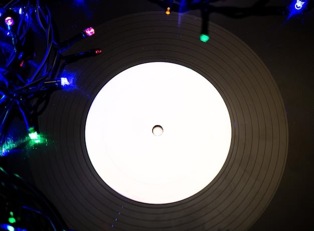 A vinyl record spinning on a turntable, with the light glinting off the grooves. The album cover visible is from a well-known cult classic film. The focus is on the tactile experience of listening to vinyl and the nostalgia it evokes.