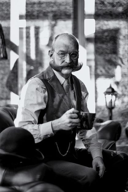 A black and white photograph of George V. Higgins, the author of 'The Friends of Eddie Coyle', sitting at a typewriter. The image captures the gritty, realistic style of his writing, reflecting The Anti-Hero's Journey: Unpacking the Moral Ambiguity of 'The Friends of Eddie Coyle' (1973).