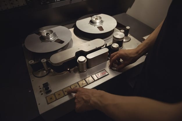 A dark, moody shot of an old reel-to-reel tape recorder with glowing vacuum tubes, surrounded by vintage audio equipment, symbolizing experimental sound design.